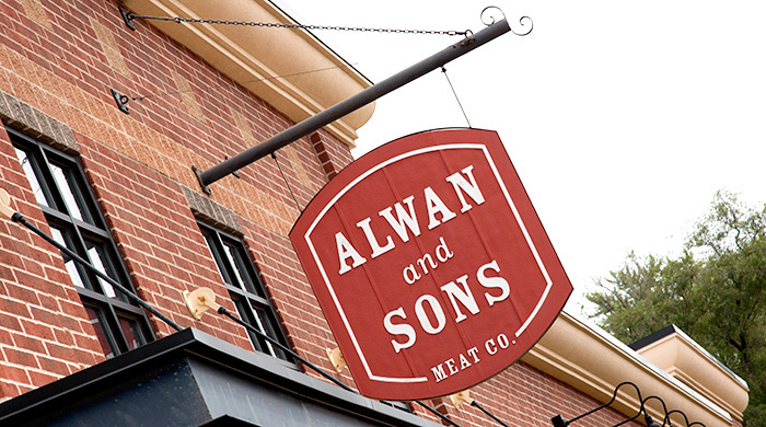 Outdoor logo and sign at Alwan and Sons location